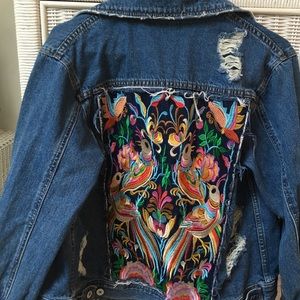 Distressed denim jacket